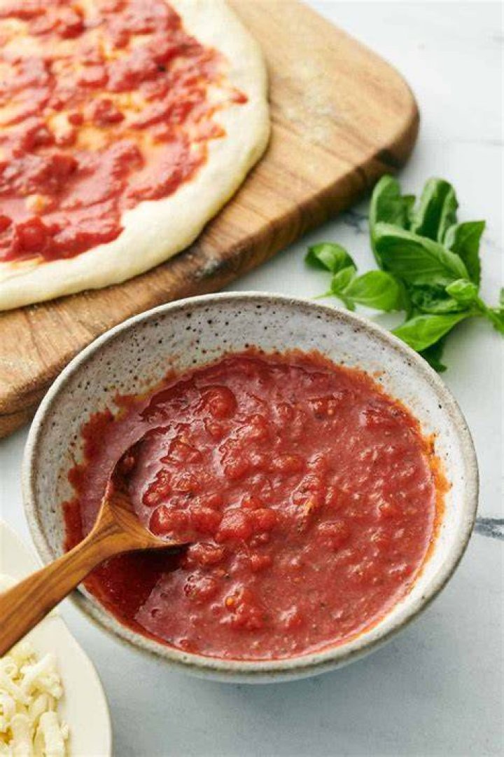 How do you make pizza sauce thicker?