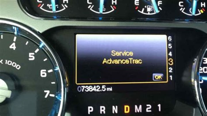 What does service AdvanceTrac warning mean?