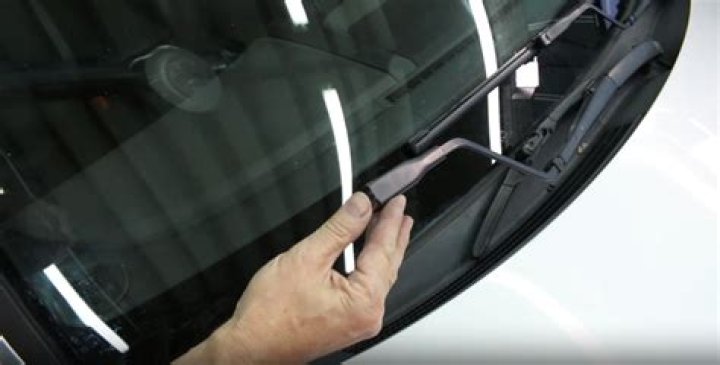 Where is the button for windshield wipers?